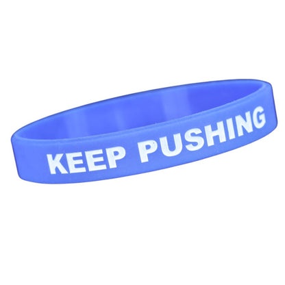 Keep Pushing Wristband TSRE | Tampa School of Real Estate 